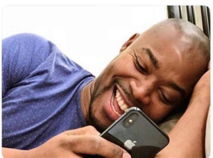 Guy on Phone Smiling Romance