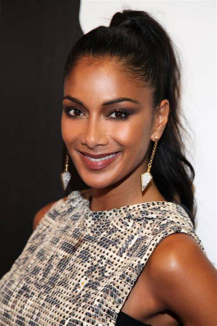 Hawaii, HI - *EXCLUSIVE* - Singer Nicole Scherzinger is seen having a little fun in the sun on the beach with her cousins during her sun-soaked holiday in Hawaii. The 44-year-old Pussycat Doll showed off her sultry physique wearing her sexy animal-printed bikini out on Makaha Beach with the family. The sexy star recently revealed some happy news on social media as she announced that she is engaged to her beau Thom Evans after three years of dating. **SHOT ON 06/26/2023** Pictured: Nicole Scherzinger BACKGRID USA 28 JUNE 2023 USA: +1 310 798 9111 / UK: +44 208 344 2007 / *UK Clients - Pictures Containing Children Please Pixelate Face Prior To Publication*