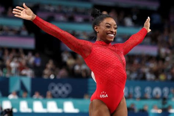 Simone Biles cheering during the Women's vault final at the Tokyo Olympics on August 1, 2021