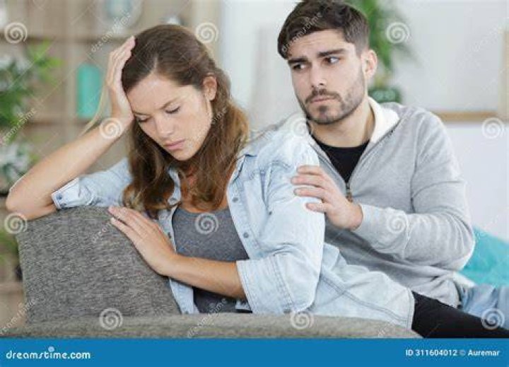 upset couple on couch